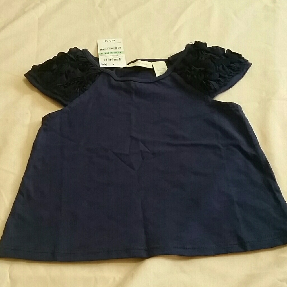 - NWT. Navy rosette-sleeve baby tee. Size 18 mo.